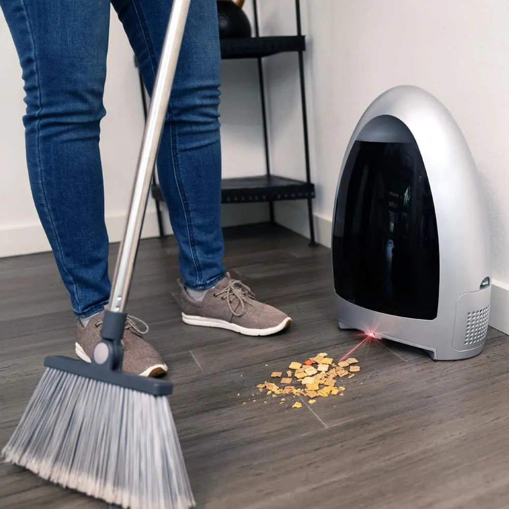 Woman sweeping in front of EyeVac